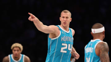 Mar 27, 2022; Brooklyn, New York, USA; Charlotte Hornets center Mason Plumlee (24) reacts after a basket against the Brooklyn Nets during the second half at Barclays Center. Mandatory Credit: Vincent Carchietta-USA TODAY Sports