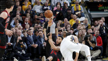 INDIANAPOLIS, IN - JANUARY 29: Denzel Valentine #45 of the Chicago Bulls passes the ball after going to the floor against the Indiana Pacers in the second half of a game at Bankers Life Fieldhouse on January 29, 2020 in Indianapolis, Indiana. The Pacers defeated the Bulls 115-106 in overtime. NOTE TO USER: User expressly acknowledges and agrees that, by downloading and or using this Photograph, user is consenting to the terms and conditions of the Getty Images License Agreement. (Photo by Joe Robbins/Getty Images)