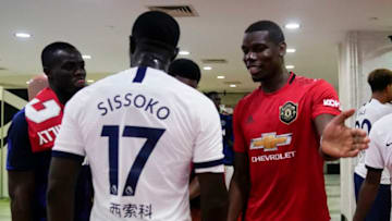 SHANGHAI, CHINA - JULY 25: Paul Pogba of Manchester United and Moussa Sissoko of Tottenham Hotspur shake hands prior to the International Champions Cup match between Tottenham Hotspur and Manchester United at the Shanghai Hongkou Stadium on July 25, 2019 in Shanghai, China. (Photo by Fred Lee/Getty Images )
