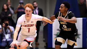 ANAHEIM, CA - DECEMBER 01: Brandon Childress #0 of the Wake Forest Demon Deacons guards Nico Mannion #1 of the Arizona Wildcats as he takes the ball down court in the second half of the game during the Wooden Legacy at the Anaheim Convention Center at on December 1, 2019 in Anaheim, California. (Photo by Jayne Kamin-Oncea/Getty Images)