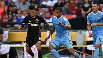 Oct 16, 2016; Washington, DC, USA; D.C. United midfielder Luciano Acosta (11) dribbles as New York City FC forward David Villa (7) defends during the second half at Robert F. Kennedy Memorial. D.C. United defeated New York City FC 3-1. Mandatory Credit: Tommy Gilligan-USA TODAY Sports