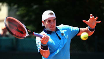 PARIS, FRANCE - JUNE 01: John Isner of The United States plays a forehand during the mens singles second round match against Paolo Lorenzi of Italy on day five of the 2017 French Open at Roland Garros on June 1, 2017 in Paris, France. (Photo by Alex Pantling/Getty Images)