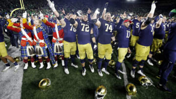 SOUTH BEND, IN - OCTOBER 12: Notre Dame Fighting Irish players celebrate after a game against the USC Trojans at Notre Dame Stadium on October 12, 2019 in South Bend, Indiana. Notre Dame defeated USC 30-27. (Photo by Joe Robbins/Getty Images)