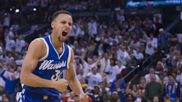 December 25, 2015; Oakland, CA, USA; Golden State Warriors guard Stephen Curry (30) celebrates in the third quarter of a NBA basketball game on Christmas against the Cleveland Cavaliers at Oracle Arena. The Warriors defeated the Cavaliers 89-83. Mandatory Credit: Kyle Terada-USA TODAY Sports