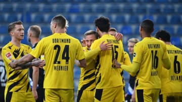 Borussia Dortmund players celebrate Mats Hummels' goal (Photo by INA FASSBENDER/POOL/AFP via Getty Images)