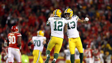 KANSAS CITY, MISSOURI - OCTOBER 27: Quarterback Aaron Rodgers #12 and wide receiver Allen Lazard #13 of the Green Bay Packers celebrate after a touchdown during the game against the Kansas City Chiefs at Arrowhead Stadium on October 27, 2019 in Kansas City, Missouri. (Photo by Jamie Squire/Getty Images)