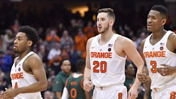 Jan 4, 2017; Syracuse, NY, USA; Syracuse Orange guard John Gillon (4) and forward Tyler Lydon (20) and guard Andrew White III (3) come off the court during a timeout in the second half of a game against the Miami Hurricanes at the Carrier Dome. Syracuse won 70-55. Mandatory Credit: Mark Konezny-USA TODAY Sports