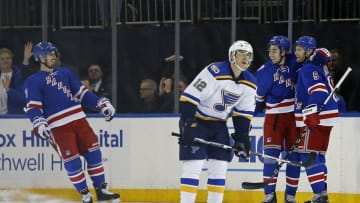 Nov 1, 2016; New York, NY, USA; New York Rangers defenseman Dan Girardi (5) celebrates with teammates after scoring against the St. Louis Blues during the first period at Madison Square Garden. Mandatory Credit: Adam Hunger-USA TODAY Sports