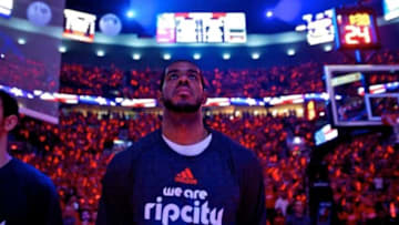 May 10, 2014; Portland, OR, USA; Portland Trail Blazers forward LaMarcus Aldridge (12) looks up during pre game introductions in game three of the second round of the 2014 NBA Playoffs against the San Antonio Spurs at the Moda Center. Mandatory Credit: Craig Mitchelldyer-USA TODAY Sports