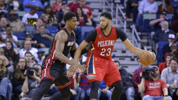 Dec 23, 2016; New Orleans, LA, USA; New Orleans Pelicans forward Anthony Davis (23) handles the ball defended by Miami Heat center Hassan Whiteside (21) during the second quarter at the Smoothie King Center. Mandatory Credit: Matt Bush-USA TODAY Sports