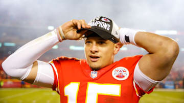 KANSAS CITY, MO - DECEMBER 30: Patrick Mahomes #15 of the Kansas City Chiefs puts on an AFC West Champions hat at the conclusion of the 35-3 victory over the Oakland Raiders at Arrowhead Stadium on December 30, 2018 in Kansas City, Missouri. (Photo by David Eulitt/Getty Images)