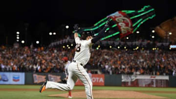 Oct 16, 2014; San Francisco, CA, USA; San Francisco Giants pinch hitter Michael Morse (38) hits a solo home run against the St. Louis Cardinals during the eighth inning of game five of the 2014 NLCS playoff at AT&T Park. Mandatory Credit: Kyle Terada-USA TODAY Sports