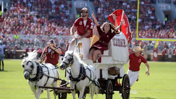 Oct 15, 2016; Norman, OK, USA; Members of the Oklahoma Sooners spirit squad celebrate after a touchdown against the Kansas State Wildcats during the second quarter at Gaylord Family - Oklahoma Memorial Stadium. Mandatory Credit: Mark D. Smith-USA TODAY Sports
