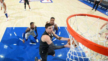 PHILADELPHIA, PA - APRIL 3: Joe Harris #12 of the Brooklyn Nets goes up for the layup against the Philadelphia 76ers at Wells Fargo Center on April 3, 2018 in Philadelphia, Pennsylvania NOTE TO USER: User expressly acknowledges and agrees that, by downloading and/or using this Photograph, user is consenting to the terms and conditions of the Getty Images License Agreement. Mandatory Copyright Notice: Copyright 2018 NBAE (Photo by Jesse D. Garrabrant/NBAE via Getty Images)