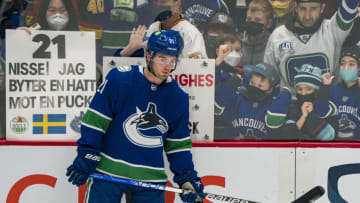 Feb 21, 2022; Vancouver, British Columbia, CAN; Vancouver Canucks forward Nils Hoglander (21) warms up in front of the Family Day holiday fans prior to a game against the Seattle Kraken at Rogers Arena. Mandatory Credit: Bob Frid-USA TODAY Sports