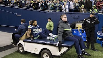 Dec 4, 2016; Seattle, WA, USA; Seattle Seahawks free safety Earl Thomas (29) is taken off the field after getting injured during the second quarter in a game against the Carolina Panthers at CenturyLink Field. Mandatory Credit: Troy Wayrynen-USA TODAY Sports