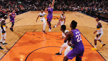PHOENIX, AZ - MARCH 1: Devin Booker #1 of the Phoenix Suns shoots the ball against the New Orleans Pelicans on March 1, 2019 at Talking Stick Resort Arena in Phoenix, Arizona. NOTE TO USER: User expressly acknowledges and agrees that, by downloading and or using this photograph, user is consenting to the terms and conditions of the Getty Images License Agreement. Mandatory Copyright Notice: Copyright 2019 NBAE (Photo by Barry Gossage/NBAE via Getty Images)