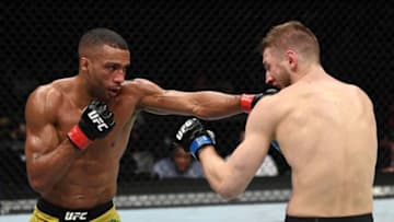 MILWAUKEE, WISCONSIN - DECEMBER 15: (L-R) Edson Barboza of Brazil punches Dan Hooker of New Zealand in their lightweight bout during the UFC Fight Night event at Fiserv Forum on December 15, 2018 in Milwaukee, Wisconsin. (Photo by Jeff Bottari/Zuffa LLC/Zuffa LLC via Getty Images)