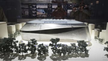 MADRID, SPAIN - SEPTEMBER 30: Club members watch a model proposed for the renovation of Santiago Bernabeu stadium during the Real Madrid General Meeting 2012 at Ifema on September 30, 2012 in Madrid, Spain. (Photo by Angel Martinez/Real Madrid via Getty Images)