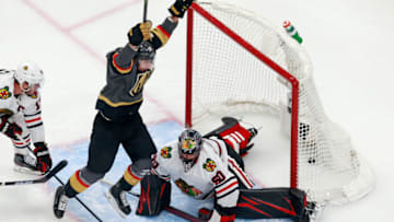 Reilly Smith #19 of the Vegas Golden Knights scores the game-winning goal at 7:13 of overtime against the Chicago Blackhawks to win the game 4-3 in Game Two of the Western Conference First Round during the 2020 NHL Stanley Cup Playoffs. (Photo by Jeff Vinnick/Getty Images)