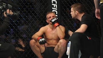 Jan 17, 2016; Boston, MA, USA; TJ Dillashaw (red) looks on after his loss to Dominick Cruz (not pictured) in a world bantamweight championship bout at UFC Fight Night at the TD Garden. Cruz won after five rounds by split decision. Mandatory Credit: Bob DeChiara-USA TODAY Sports