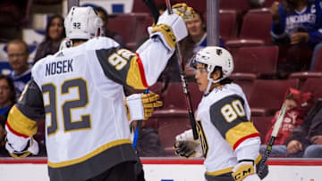 VANCOUVER, BC - SEPTEMBER 17: Tyler Wong #80 of the Las Vegas Golden Knights is congratulated by teammate Tomas Nosek #92 after scoring his second goal of the game against the Vancouver Canucks in NHL pre-season action on September 17, 2017 at Rogers Arena in Vancouver, British Columbia, Canada. (Photo by Rich Lam/Getty Images)