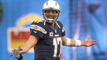 Dec 14, 2014; San Diego, CA, USA; San Diego Chargers quarterback Philip Rivers (17) yells at referees after a replay went against the Chargers during the third period against the Denver Broncos at Qualcomm Stadium. Mandatory Credit: Robert Hanashiro-USA TODAY Sports