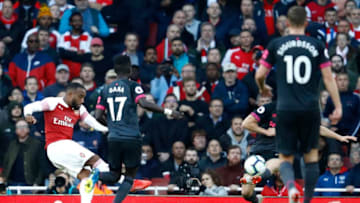 LONDON, ENGLAND - SEPTEMBER 23: Alexandre Lacazette of Arsenal scores his sides first goal during the Premier League match between Arsenal FC and Everton FC at Emirates Stadium on September 23, 2018 in London, United Kingdom. (Photo by Julian Finney/Getty Images)