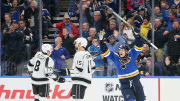 St. Louis Blues right wing Scottie Upshall, right, reacts after he assisted on a goal by defenseman Carl Gunnarsson in the second period during a game between the St. Louis Blues and the Los Angeles Kings on Monday, Oct. 30, 2017, at the Scottrade Center in St. Louis. The Blues won, 4-2. (Chris Lee/St. Louis Post-Dispatch/TNS via Getty Images)
