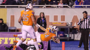 BOISE, ID - OCTOBER 12: Running back George Holani #24 of the Boise State Broncos dives in for a touchdown during second half action against the Hawai'i Rainbow Warriors on October 12, 2019 at Albertsons Stadium in Boise, Idaho. Boise State won the game 59-37. (Photo by Loren Orr/Getty Images)