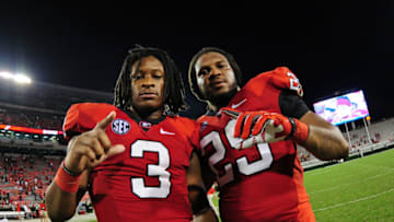 ATHENS, GA - SEPTEMBER 22: Todd Gurley #3 and Jarvis Jones #29 of the Georgia Bulldogs celebrate after the game against the Vanderbilt Commodores at Sanford Stadium on September 22, 2012 in Athens, Georgia. (Photo by Scott Cunningham/Getty Images)
