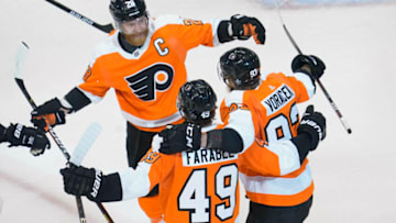 Aug 19, 2020; Toronto, Ontario, CAN; Philadelphia Flyers right wing Jakub Voracek (93) celebrates with left wing Joel Farabee (49) and center Claude Giroux (28) his second goal of the game scored against the Montreal Canadiens during the second period in game five of the first round of the 2020 Stanley Cup Playoffs at Scotiabank Arena. Mandatory Credit: John E. Sokolowski-USA TODAY Sports