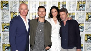 SAN DIEGO, CALIFORNIA - JULY 20: (L-R) Neal McDonough, Michael Malarkey, Laura Mennell and Aidan Gillen attend HISTORY's Project Blue Book SDCC Panel 2019 at Hilton San Diego Bayfront Hotel on July 20, 2019 in San Diego, California. (Photo by Joe Scarnici/Getty Images for HISTORY)