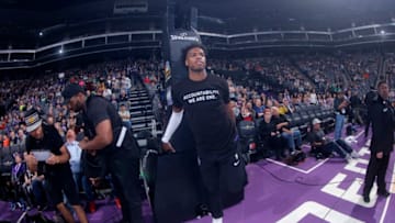 SACRAMENTO, CA - MARCH 25: Buddy Hield #24 of the Sacramento Kings warms up with a shirt to honor Stephon Clark during the game against the Boston Celtics on March 25, 2018 at Golden 1 Center in Sacramento, California. NOTE TO USER: User expressly acknowledges and agrees that, by downloading and or using this photograph, User is consenting to the terms and conditions of the Getty Images Agreement. Mandatory Copyright Notice: Copyright 2018 NBAE (Photo by Rocky Widner/NBAE via Getty Images)