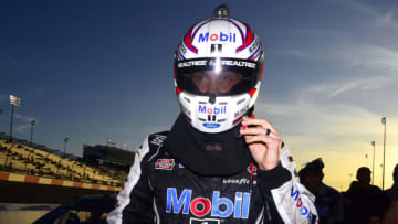 RICHMOND, VIRGINIA - SEPTEMBER 20: Kevin Harvick, driver of the #4 Mobil 1 Ford, walks on the grid during qualifying for the Monster Energy NASCAR Cup Series Federated Auto Parts 400 at Richmond Raceway on September 20, 2019 in Richmond, Virginia. (Photo by Jared C. Tilton/Getty Images)