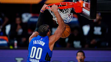 LAKE BUENA VISTA, FLORIDA - AUGUST 04: Aaron Gordon #00 dunks against the Indiana Pacers during the second half at Visa Athletic Center at ESPN Wide World Of Sports Complex on August 4, 2020 in Lake Buena Vista, Florida. NOTE TO USER: User expressly acknowledges and agrees that, by downloading and or using this photograph, User is consenting to the terms and conditions of the Getty Images License Agreement. (Photo by Ashley Landis-Pool/Getty Images)