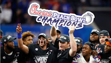 ATLANTA, GEORGIA - DECEMBER 29: The Florida Gators celebrate their teams win over the Michigan Wolverines during the Chick-fil-A Peach Bowl at Mercedes-Benz Stadium on December 29, 2018 in Atlanta, Georgia. The Gators defeated the Wolverines 41-15. (Photo by Joe Robbins/Getty Images)