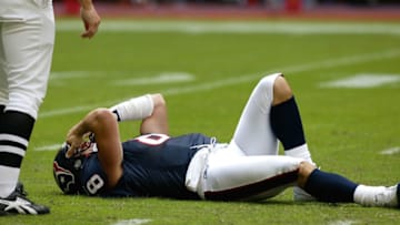 HOUSTON - OCTOBER 10: Quarterback David Carr #8 of the Houston Texans is injured during their game against the Minnesota Vikings on October 10, 2004 at Reliant Stadium in Houston, Texas. (Photo by Streeter Lecka/Getty Images)
