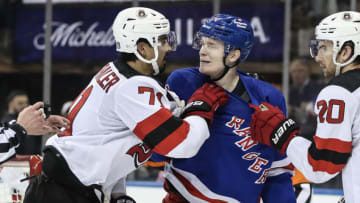 New Jersey Devils defenseman Jonas Siegenthaler (71) and New York Rangers right wing Kaapo Kakko (24) get into an altercation in game three of the first round of the 2023 Stanley Cup Playoffs at Madison Square Garden. Mandatory Credit: Wendell Cruz-USA TODAY Sports