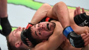 TORONTO, CANADA - DECEMBER 08: (L-R) Brad Katona of Canada attempts to submit Matthew Lopez in their bantamweight fight during the UFC 231 event at Scotiabank Arena on December 8, 2018 in Toronto, Canada. (Photo by Josh Hedges/Zuffa LLC/Zuffa LLC via Getty Images)