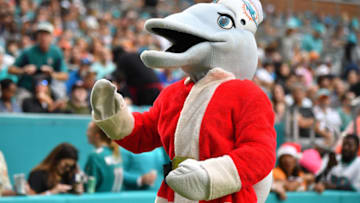 MIAMI, FLORIDA - DECEMBER 22: The Miami Dolphins mascot performs as Santa Clause during the game against the Cincinnati Bengals in the first quarter at Hard Rock Stadium on December 22, 2019 in Miami, Florida. (Photo by Mark Brown/Getty Images)