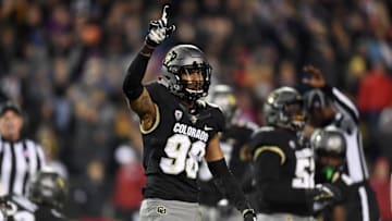 Nov 19, 2016; Boulder, CO, USA; Colorado Buffaloes linebacker Jimmie Gilbert (98) reacts following his strip sack fumble against the Washington State Cougars in the fourth quarter at Folsom Field. The Buffaloes defeated the Cougars 38-24. Mandatory Credit: Ron Chenoy-USA TODAY Sports