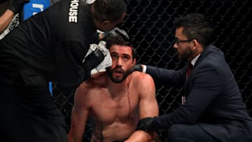 GLENDALE, AZ - APRIL 14: Carlos Condit is examined after the welterweight fight against Alex Oliveira during the UFC Fight Night at Gila River Arena on April 14, 2018 in Glendale, Arizona. (Photo by Jennifer Stewart/Getty Images)