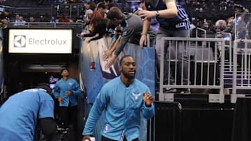 Nov 23, 2016; Charlotte, NC, USA; Charlotte Hornets guard Kemba Walker (15) enters the arena prior to the game against the San Antonio Spurs at the Spectrum Center. Mandatory Credit: Sam Sharpe-USA TODAY Sports