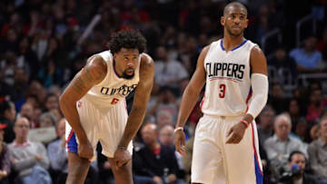 Mar 27, 2016; Los Angeles, CA, USA; Los Angeles Clippers center DeAndre Jordan (6) and guard Chris Paul (3) react during the first half during of an NBA game against the Denver Nuggets at Staples Center. The Clippers defeated the Nuggets 105-90. Mandatory Credit: Kirby Lee-USA TODAY Sports