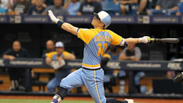 ST. PETERSBURG, FL - JUNE 10: Corey Dickerson (10) of the Rays hits a fly ball to the outfield during the MLB regular season game between the Oakland Athletics and Tampa Bay Rays on June 10, 2017, at Tropicana Field in St. Petersburg, FL. (Photo by Cliff Welch/Icon Sportswire via Getty Images)