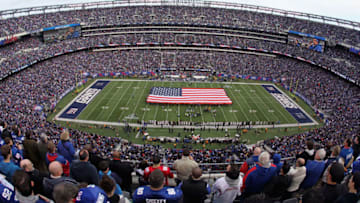 EAST RUTHERFORD, NJ - JANUARY 08: A general view of a giant American Flag stretched across the field during the performcance of the National Anthem prior to the New York Giants hosting the Atlanta Falcons during their NFC Wild Card Playoff game at MetLife Stadium on January 8, 2012 in East Rutherford, New Jersey. (Photo by Nick Laham/Getty Images)