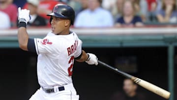 Aug 7, 2015; Cleveland, OH, USA; Cleveland Indians left fielder Michael Brantley (23) hits an RBI single during the third inning against the Minnesota Twins at Progressive Field. Mandatory Credit: Ken Blaze-USA TODAY Sports