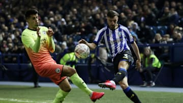 SHEFFIELD, ENGLAND - MARCH 04: Morgan Fox of Sheffield Wednesday crosses the ball with Joao Cancelo of Manchester City attempting to block during the FA Cup Fifth Round match between Sheffield Wednesday and Manchester City at Hillsborough on March 04, 2020 in Sheffield, England. (Photo by Clive Brunskill/Getty Images)