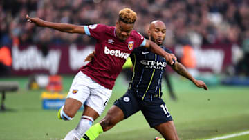 LONDON, ENGLAND - NOVEMBER 24: Fabian Delph of Manchester City tackles Grady Diangana of West Ham United during the Premier League match between West Ham United and Manchester City at London Stadium on November 24, 2018 in London, United Kingdom. (Photo by Justin Setterfield/Getty Images)